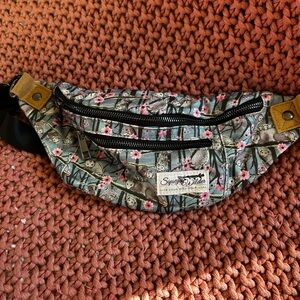 Opossum crossbody bag.